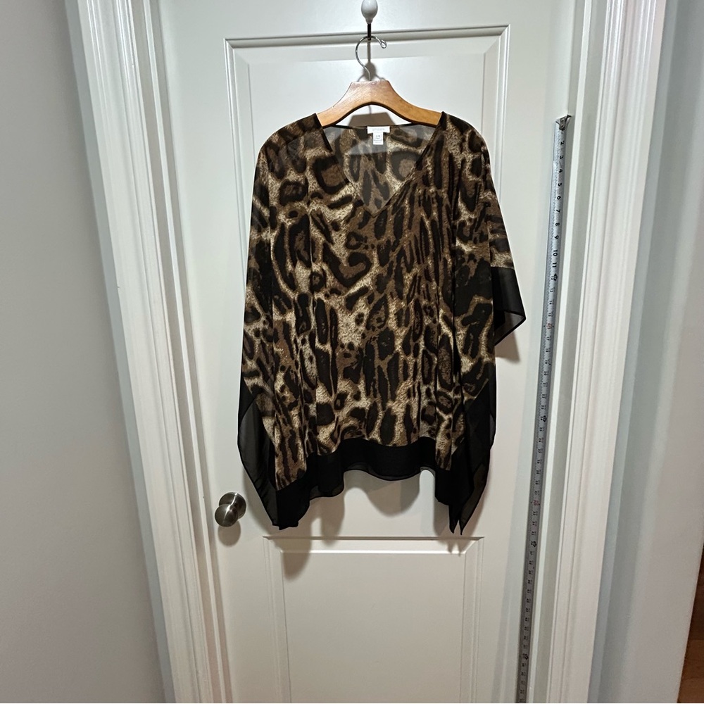 Chico’s women’s size S/M Animal Print Sheer Poncho Top with black trim. Amazing